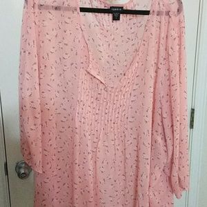 Torrid pink with small white flowers